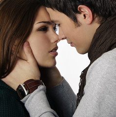 close up of attractive couple passionately in love