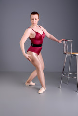 Obraz premium lady ballet dancer warm up exercises