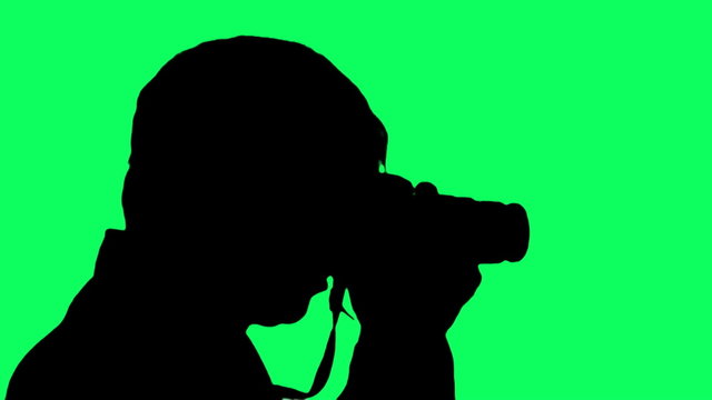 Photographer silhouette against green screen - HD