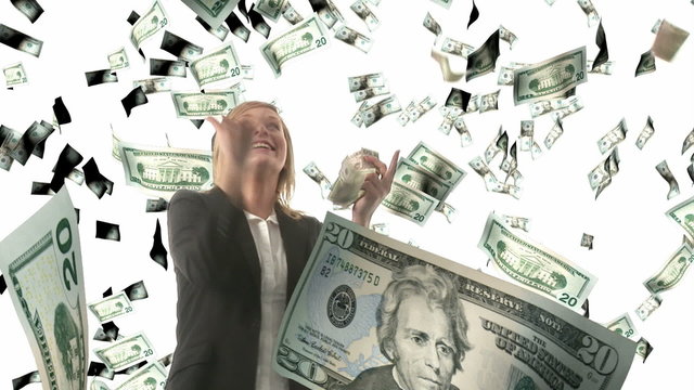 Beautiful blonde woman catching falling dollars