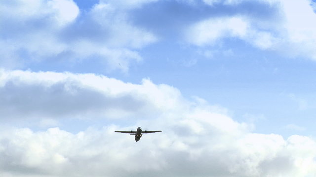 Plane flying through clouds footage
