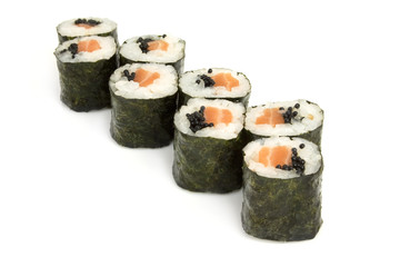 isolated sushi rolls with caviar and salmon