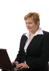 Mature business woman and laptop