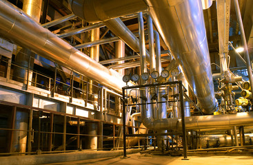 Pipes, tubes, machinery and steam turbine at a power plant