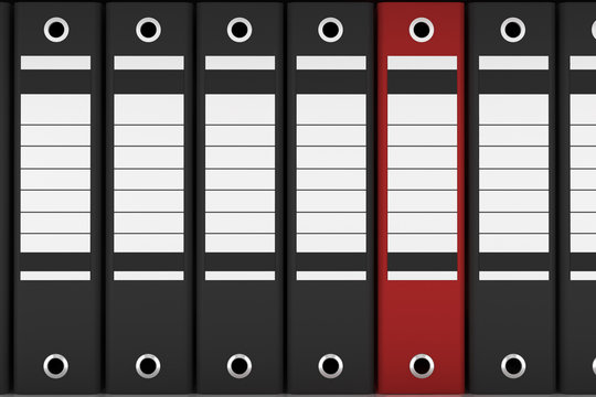 red file folder among black folders