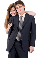 Young couple talking on the phone isolated on white