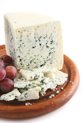 mold cheese and grapes
