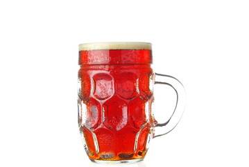 Fresh amber beer with foam isolated on white