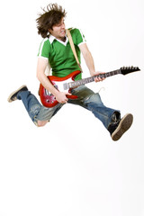 passionate guitarist jumps in the air