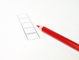Red pencil and check boxes
