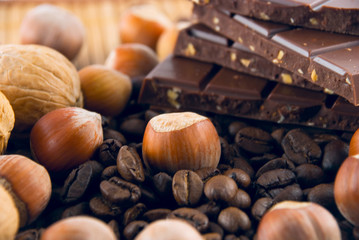 chocolate, nuts and grains of coffee