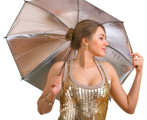 women in golden dress with a silver umbrella - 12182416