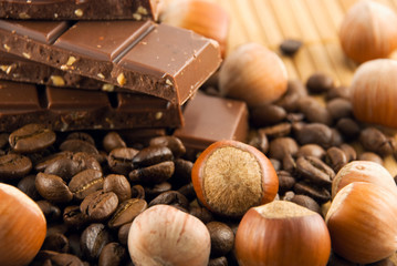 chocolate, nuts and grains of coffee