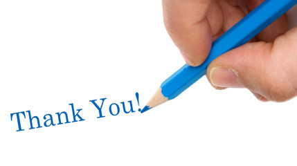 Hand with blue pen writing Thank You