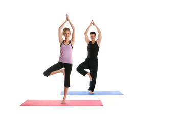 Beautiful Couple Doing Yoga Together