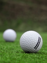 Golf - detail ball with hole on green