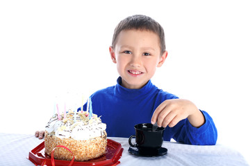 boy with birthday cake isolated on white