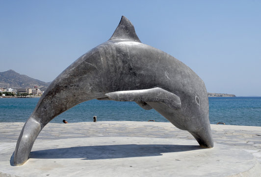 Delfino scultura