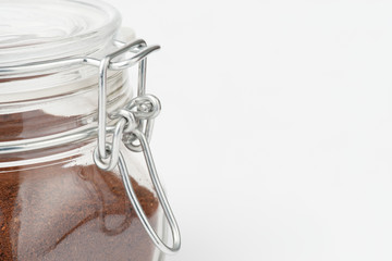Coffee container on light grey background with copy space