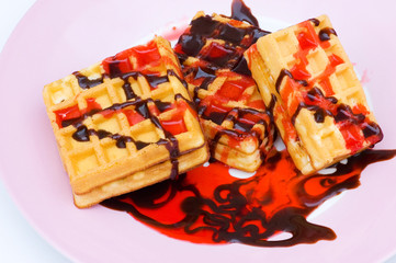 Belgian wafers with strawberry and cholocate syrup