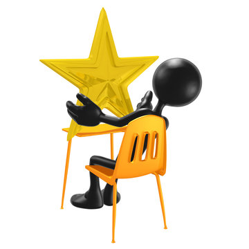 Student With A Gold Star On School Desk