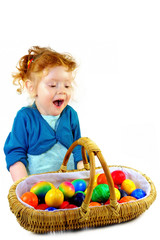 Fototapeta na wymiar Happy little girl with easter eggs