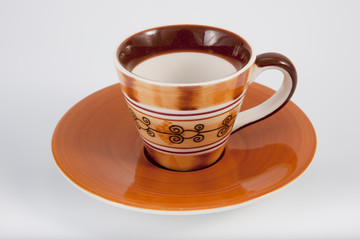 Orange Coffee Cup on White background