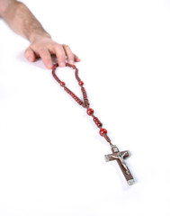 the Christian beads and human hand