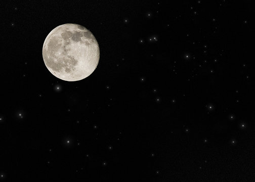 Near full moon on a large star field