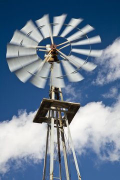 Old west-style farm windmill for pumping water