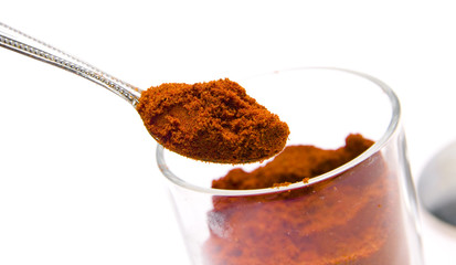 Paprika spice isolated on white background