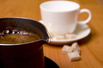 coffee-maker, cup and sugar