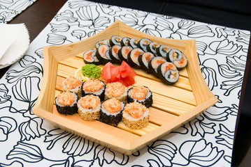 sushi on wood plate