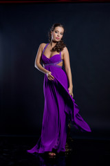 Obraz premium Young Woman In Violet Dress