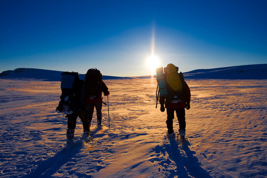 Hiker are in winter in mountains