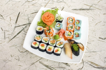 sushi assortment isolated on a white dish