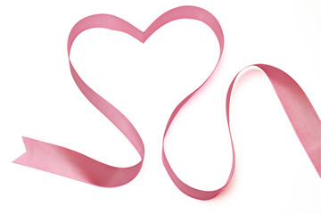 Heart from a pink tape - a symbol of love