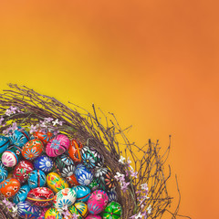 Easter Eggs basket arrangement on orange
