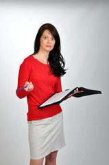 woman in red sweater working