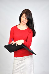 woman in red sweater working