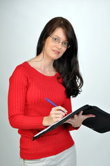 woman in red sweater working