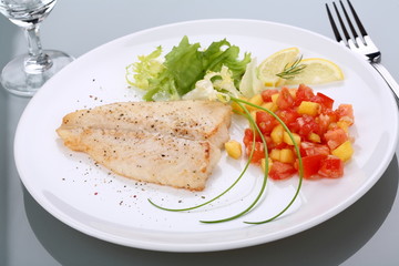 Fish dish - roasted cod with vegetable salad