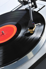 Record on turntable © Elenathewise