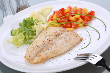 Fish dish - roasted cod with vegetable salad