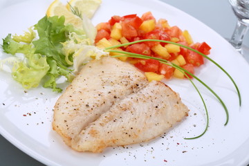 Fish dish - roasted cod with vegetable salad