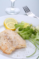 Fish dish - roasted cod with vegetable salad