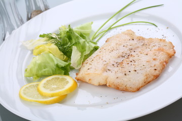 Fish dish - roasted cod with vegetable salad