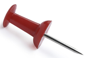 Red push-pin on white background