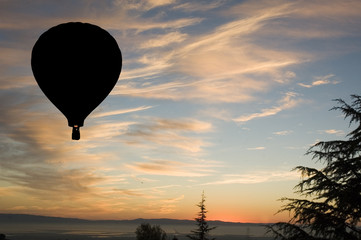 Balloon at sunset