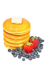 Pancakes, blueberries and strawberries